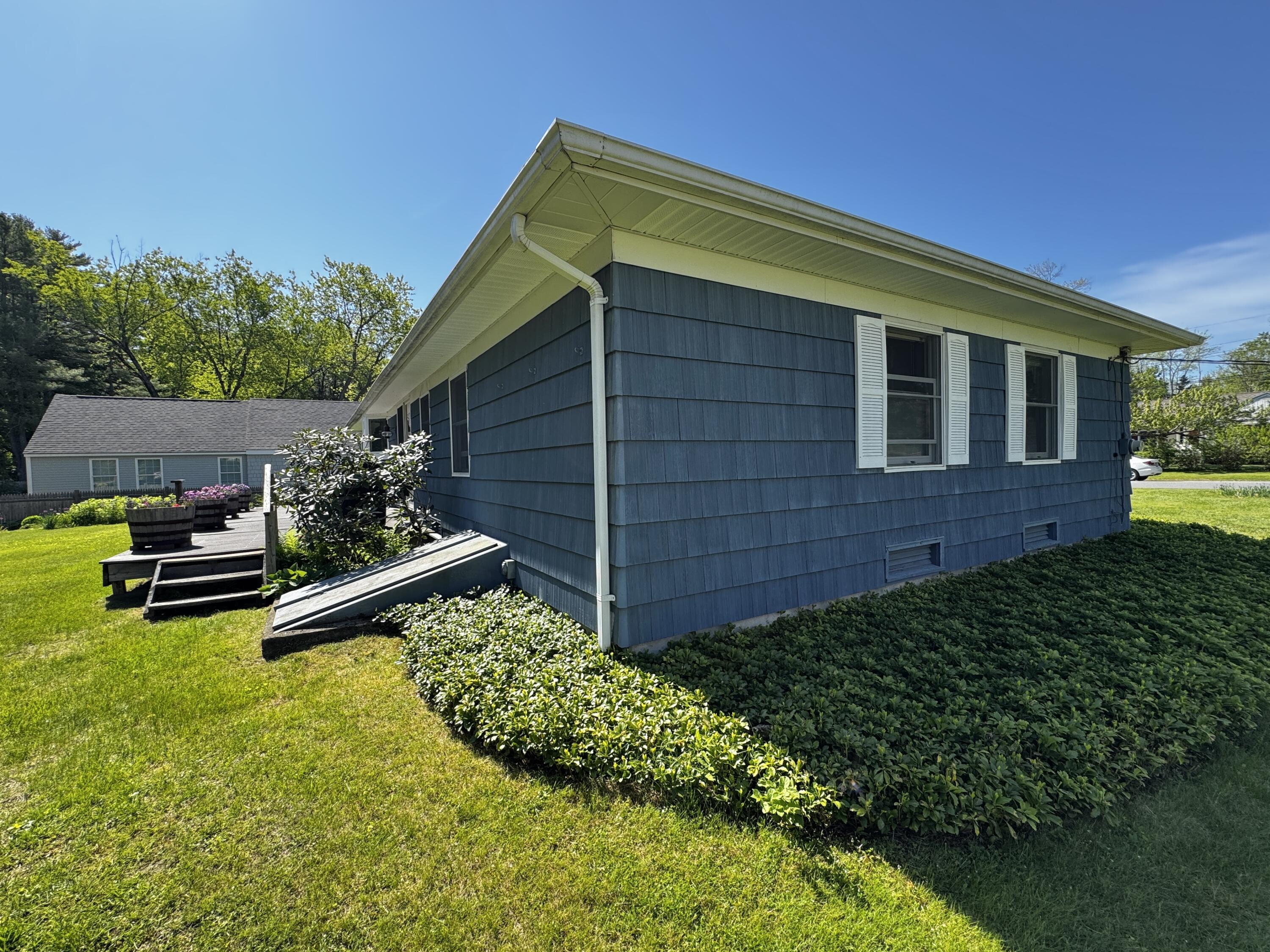 18 Rand Road Yarmouth, ME 04096 - Photo 5 of 58 Left side and back of home
