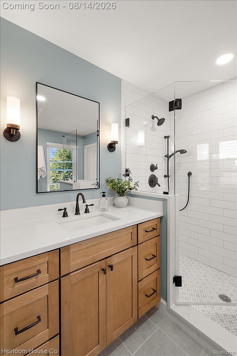45697 Bryn Mawr Road Canton, MI 48187 - Photo 41 of 75 Bathroom featuring a light wood-finish vanity with a white countertop and rectangular undermount sink