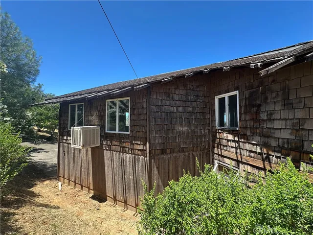 a view of balcony with wooden floor