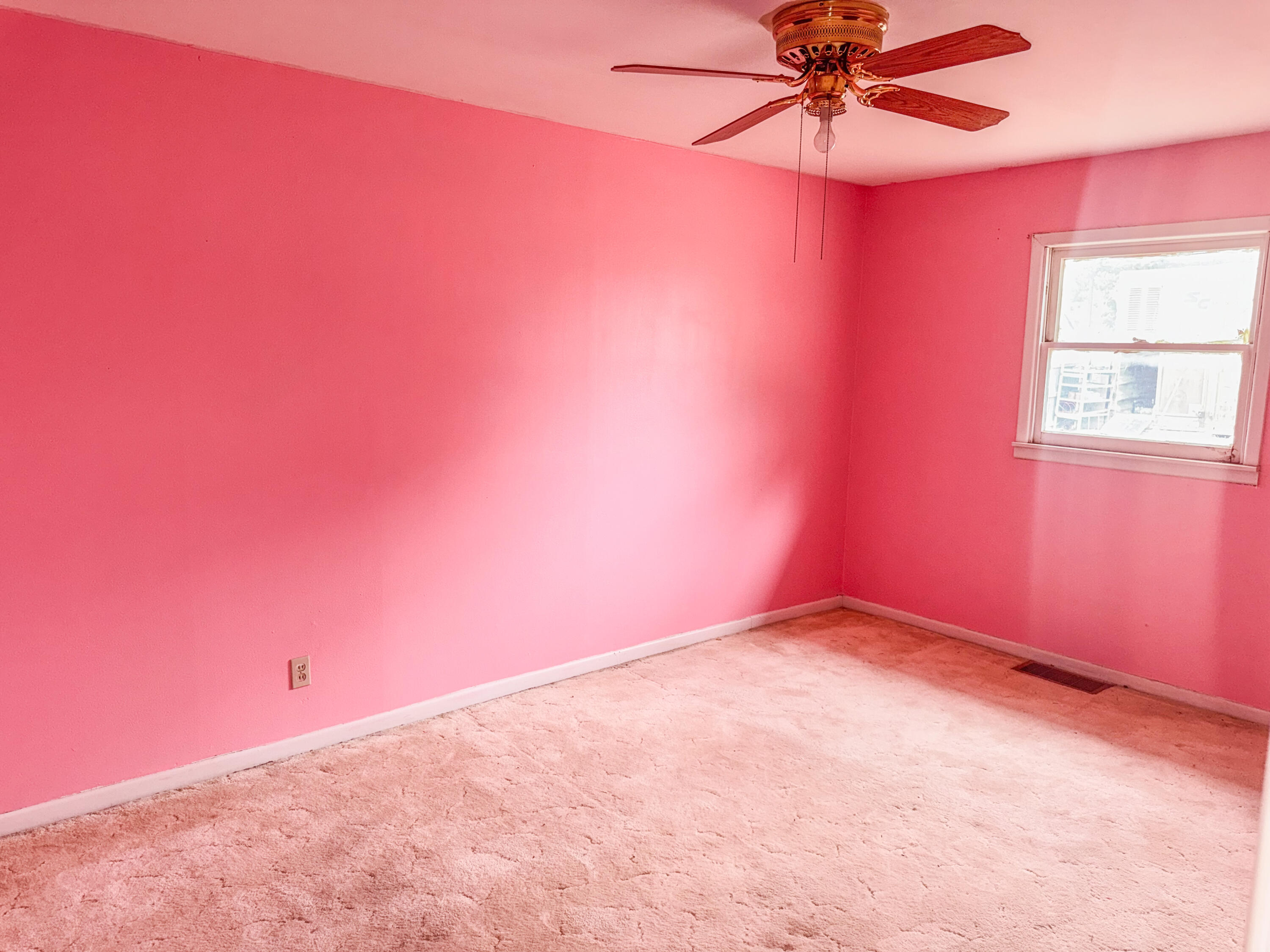 601 Northeast 3rd Street Earth, TX 79031 - Photo 8 of 8 a view of a room with a fan and a window