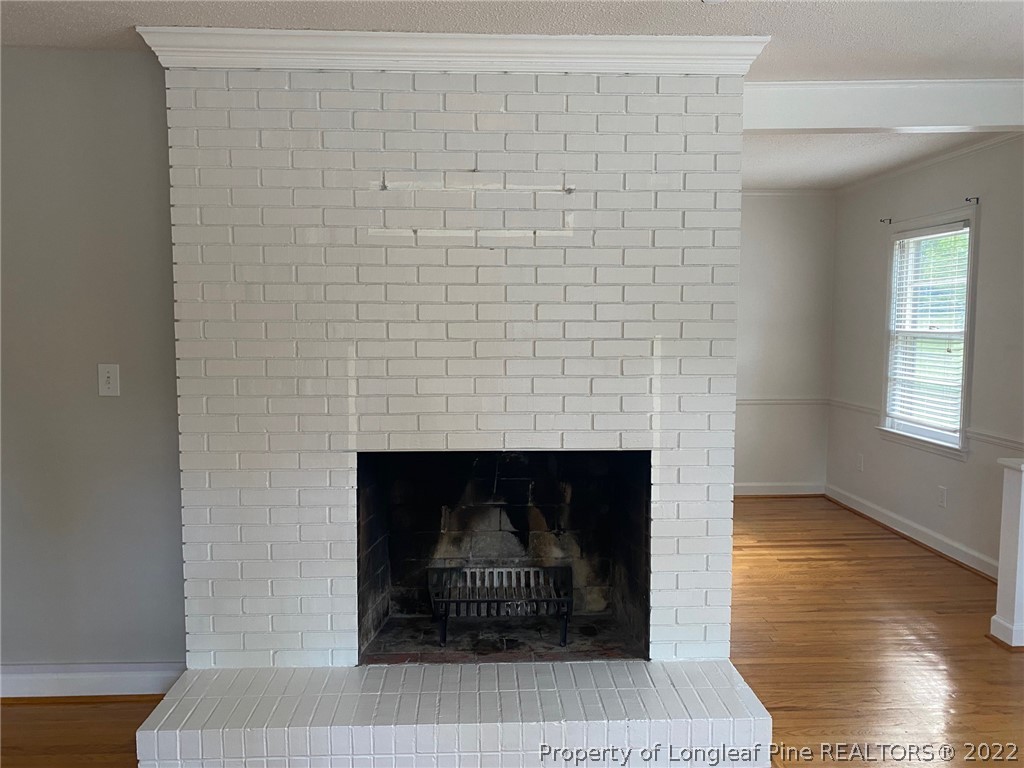 1811 Lyon Road Fayetteville, NC 28303 - Photo 11 of 27 a room with a fireplace