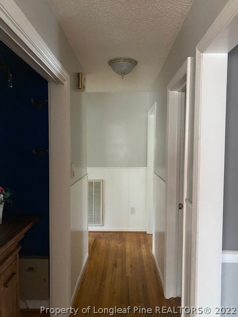 1811 Lyon Road Fayetteville, NC 28303 - Photo 16 of 27 wooden floor in an empty room
