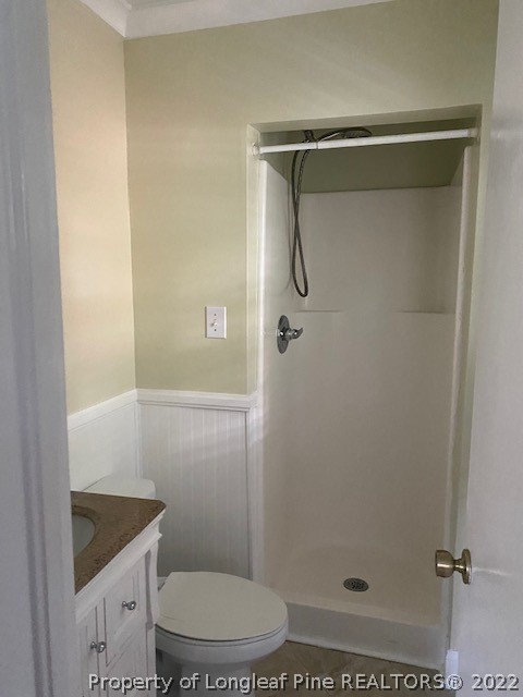 1811 Lyon Road Fayetteville, NC 28303 - Photo 20 of 27 a bathroom with a granite countertop shower and a sink