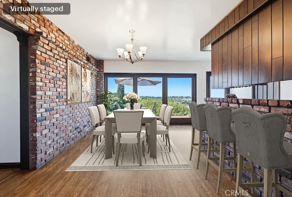 2141 Ronsard Road Rancho Palos Verdes, CA 90275 - Photo 11 of 69 a view of a dining room with furniture window and wooden floor