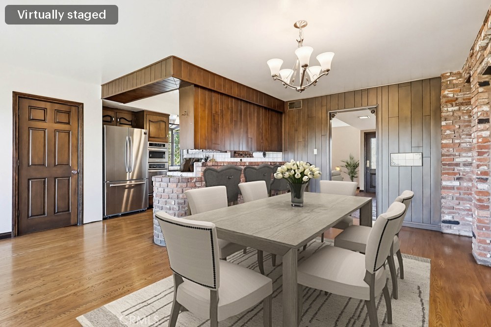 2141 Ronsard Road Rancho Palos Verdes, CA 90275 - Photo 13 of 69 a view of a dining room with furniture and a chandelier