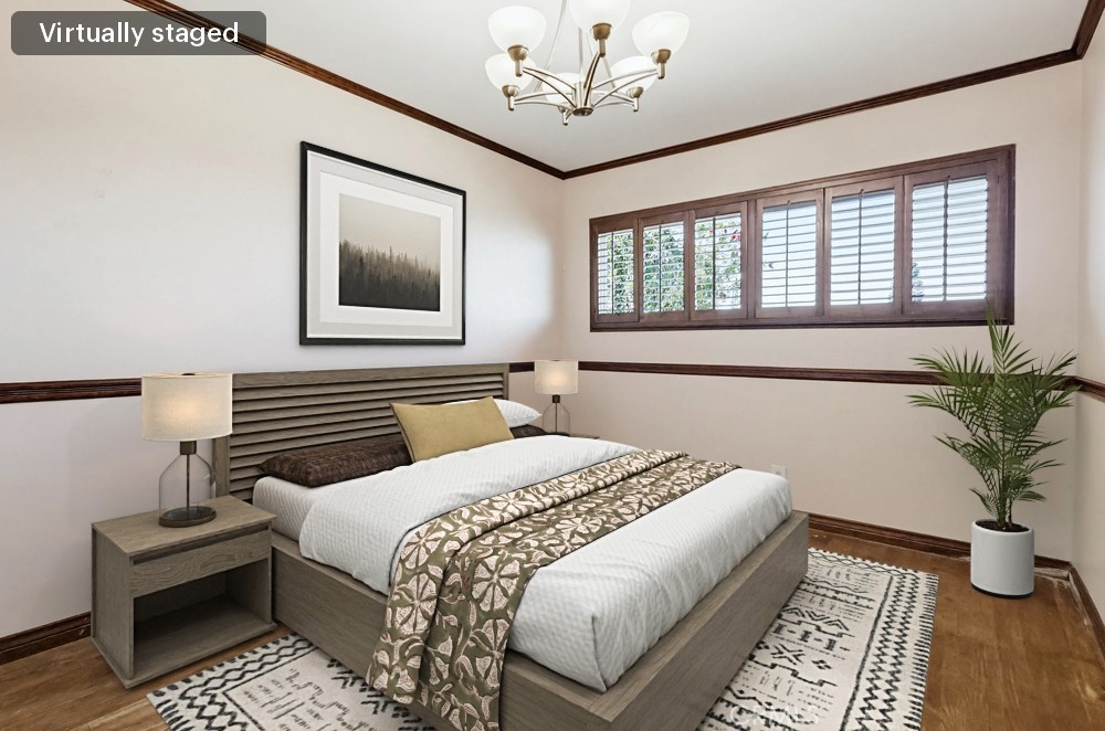 2141 Ronsard Road Rancho Palos Verdes, CA 90275 - Photo 26 of 69 a bedroom with a large bed and a chandelier