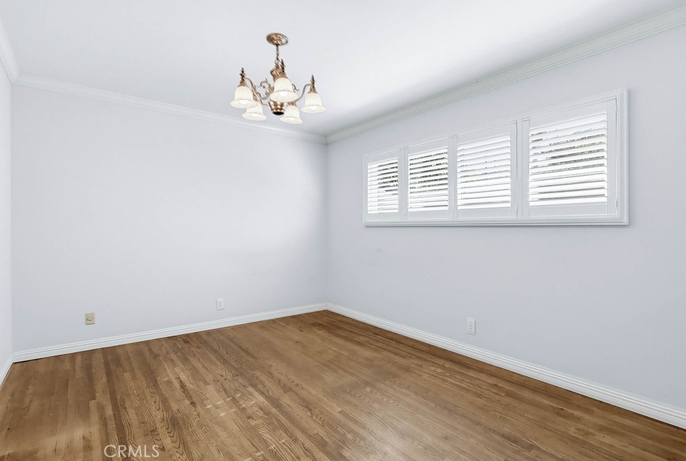2141 Ronsard Road Rancho Palos Verdes, CA 90275 - Photo 40 of 69 a view of a room with wooden floor and chandelier