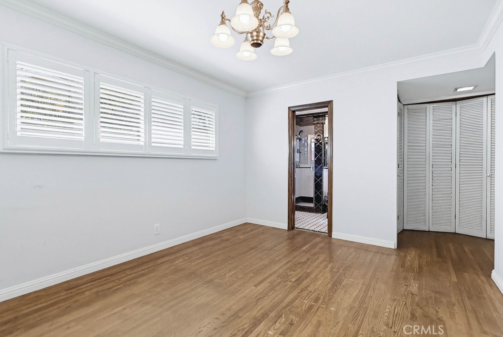 2141 Ronsard Road Rancho Palos Verdes, CA 90275 - Photo 42 of 69 a view of an empty room with wooden floor and a window