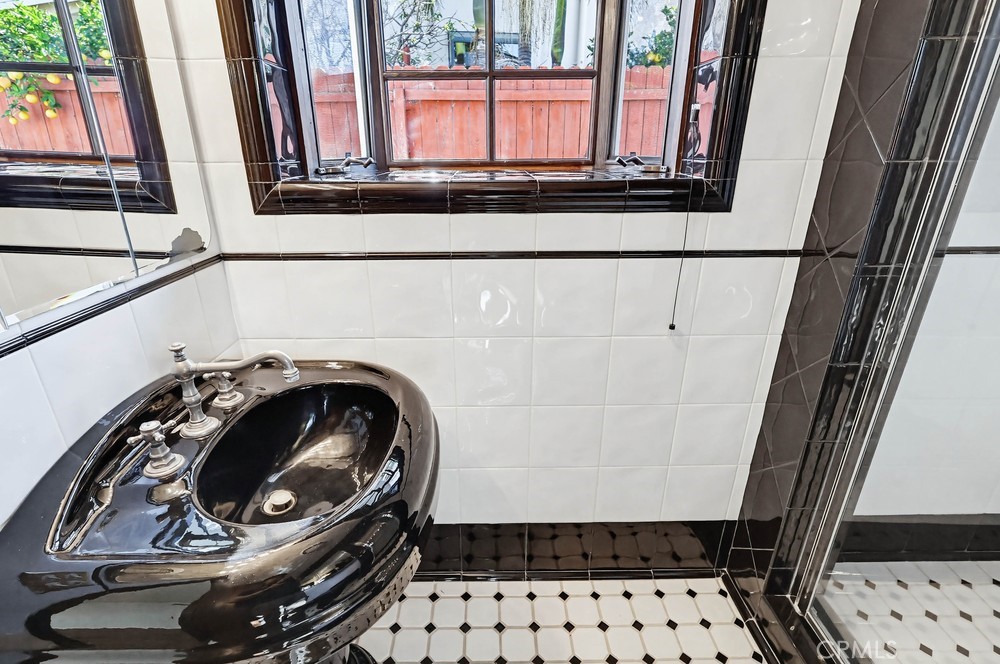 2141 Ronsard Road Rancho Palos Verdes, CA 90275 - Photo 45 of 69 a bathroom with a sink and a mirror