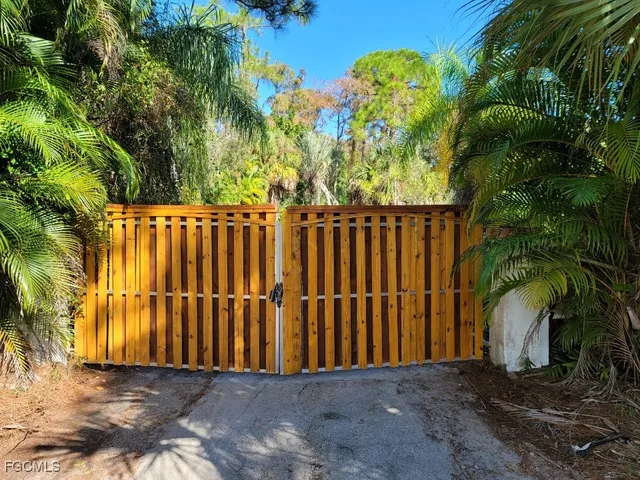 a view of a wooden fence