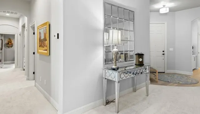 a kitchen with stainless steel appliances granite countertop a stove and a refrigerator