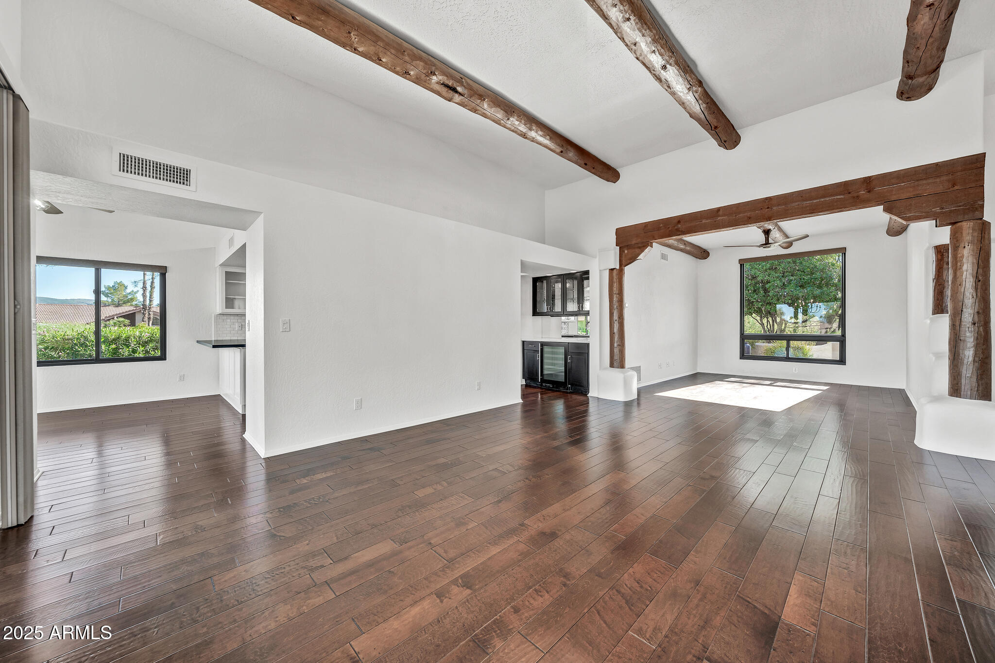 19002 East Alondra Way Rio Verde, AZ 85263 - Photo 15 of 62 a view of an empty room with window and wooden floor