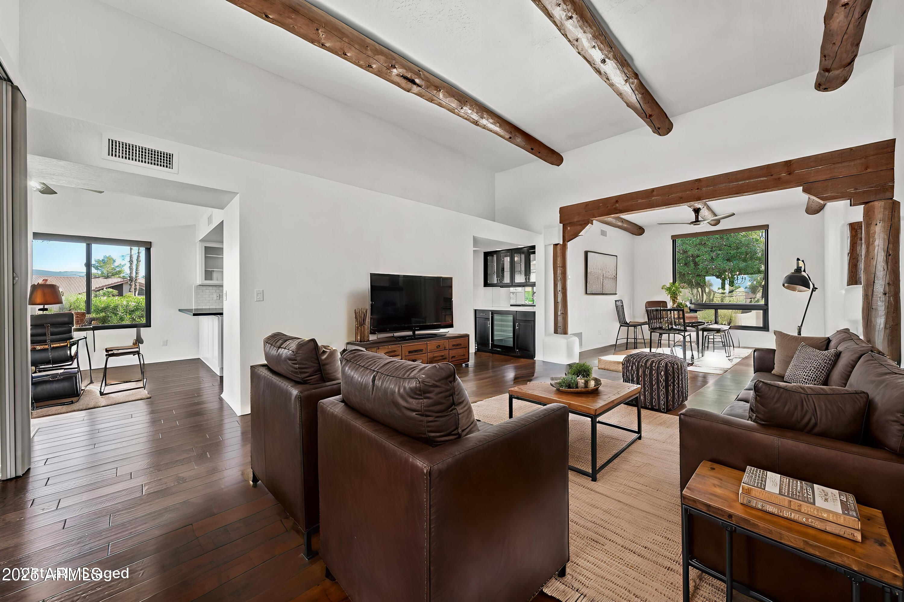 19002 East Alondra Way Rio Verde, AZ 85263 - Photo 23 of 62 a living room with furniture and a flat screen tv