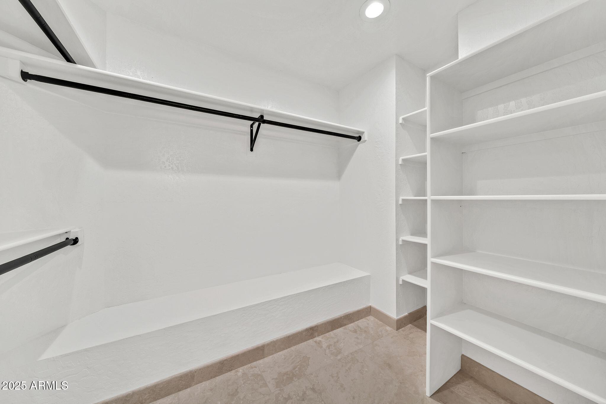 19002 East Alondra Way Rio Verde, AZ 85263 - Photo 37 of 62 a bathroom with a shower and a bath tub