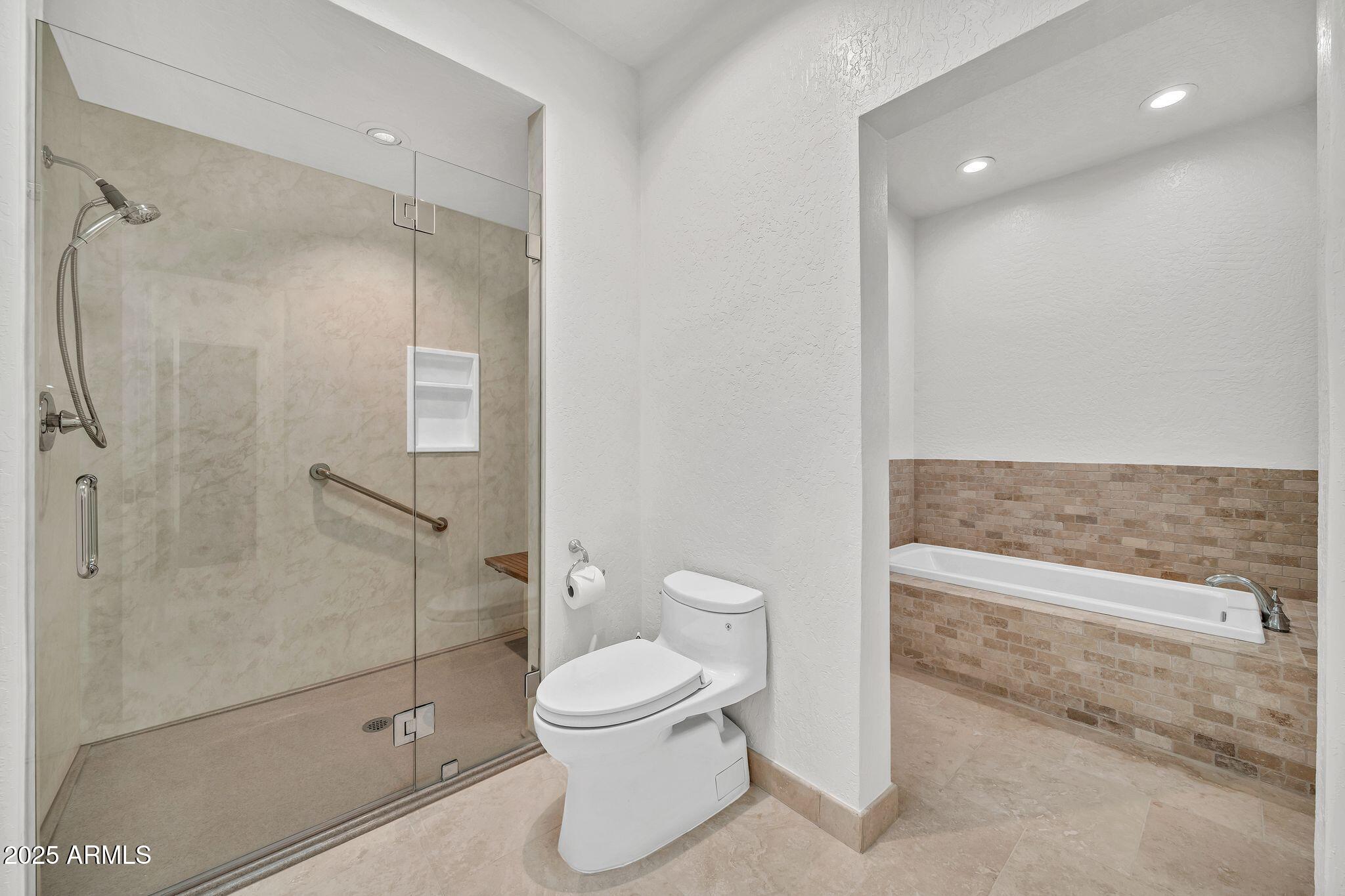 19002 East Alondra Way Rio Verde, AZ 85263 - Photo 39 of 62 a bathroom with a toilet and a shower