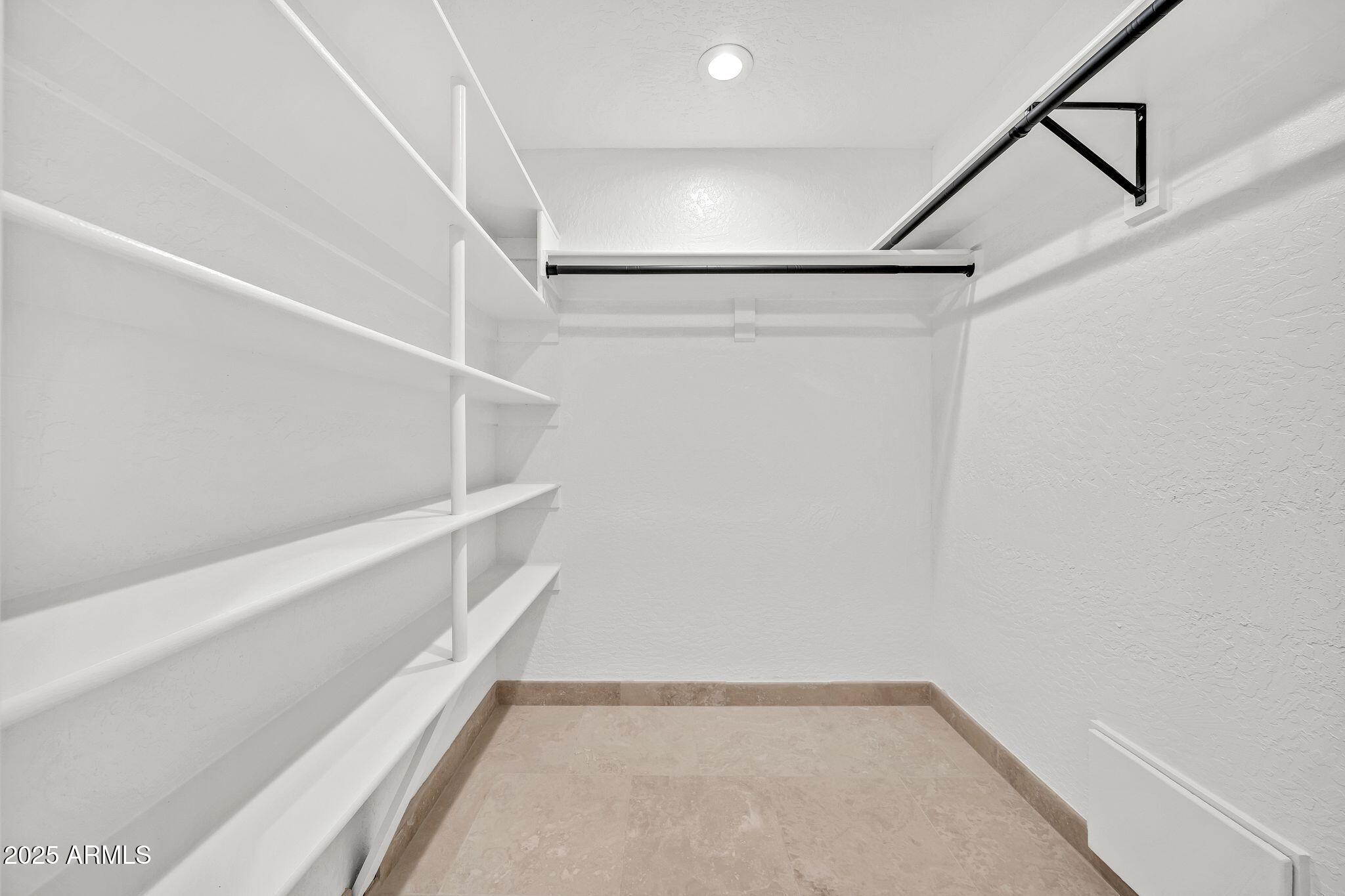 19002 East Alondra Way Rio Verde, AZ 85263 - Photo 41 of 62 a view of an empty walk in closet