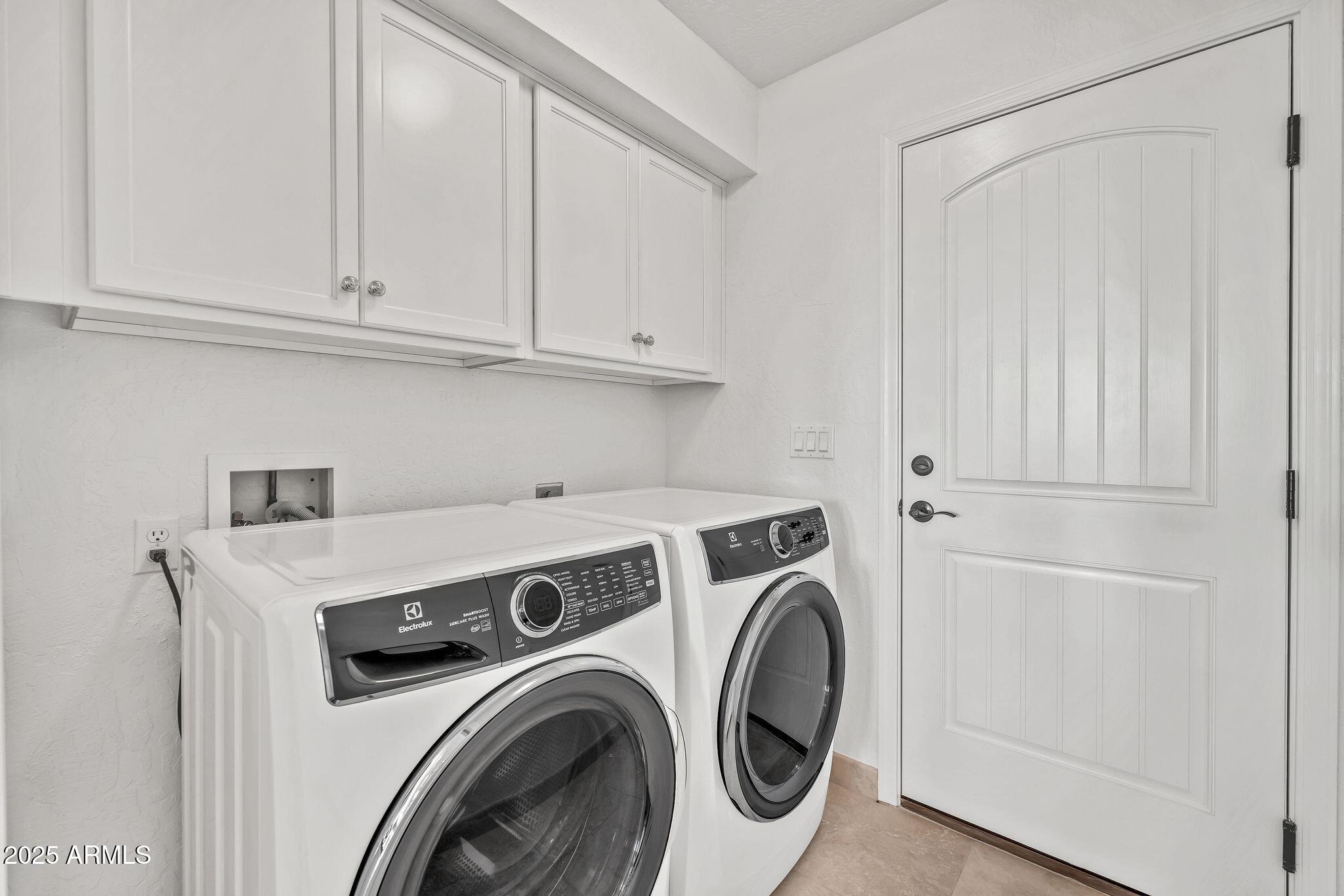 19002 East Alondra Way Rio Verde, AZ 85263 - Photo 42 of 62 a utility room with dryer and washer