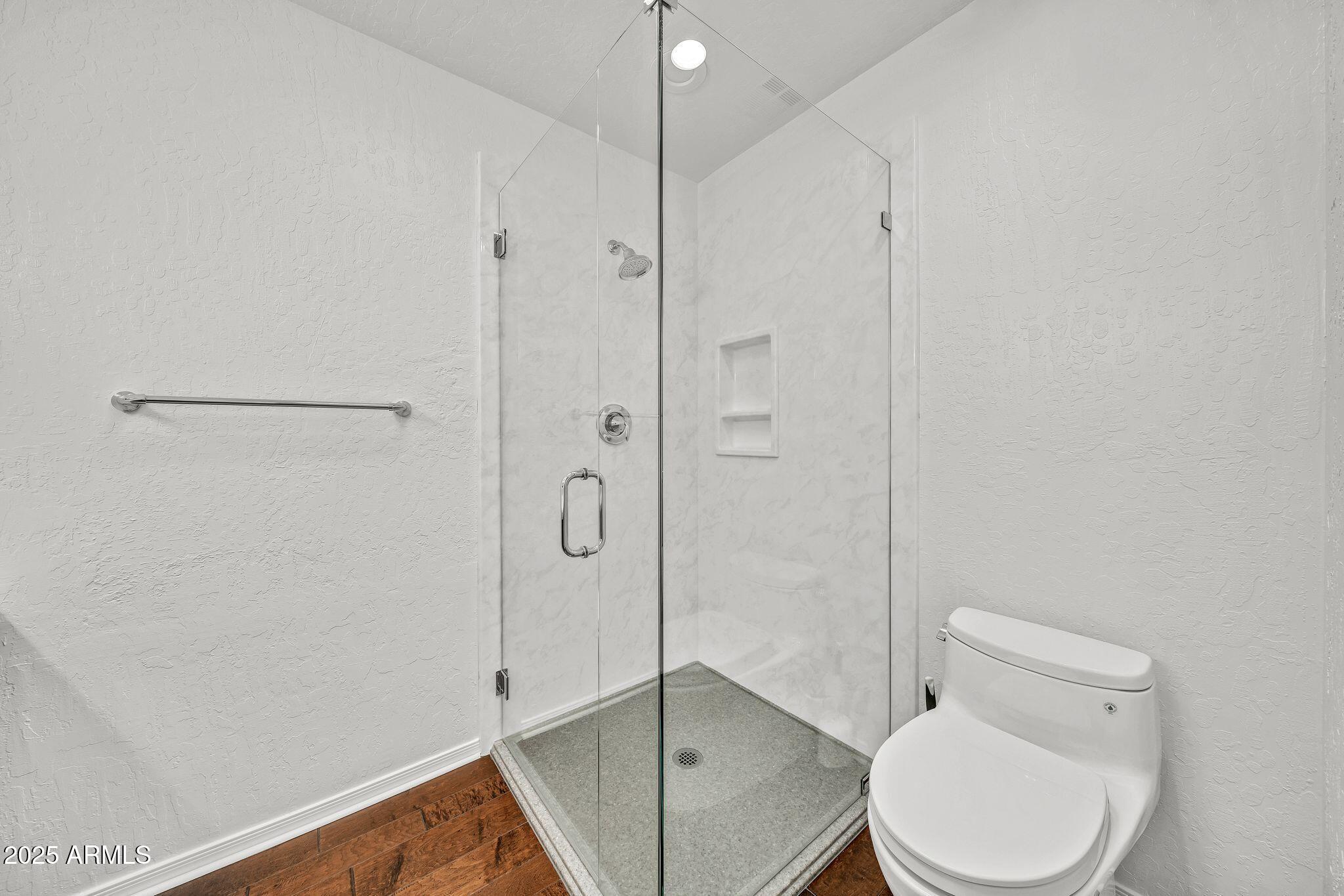 19002 East Alondra Way Rio Verde, AZ 85263 - Photo 49 of 62 a bathroom with a toilet and a shower