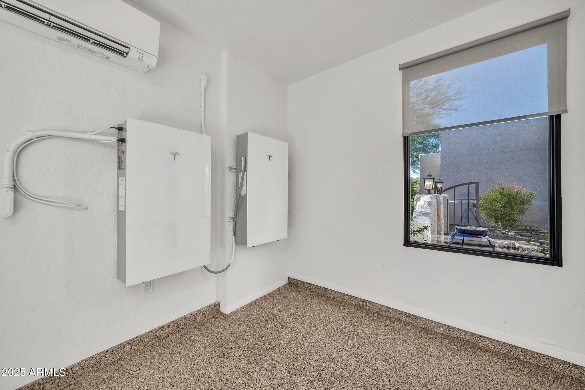 19002 East Alondra Way Rio Verde, AZ 85263 - Photo 51 of 62 Garage Tesla Batteries