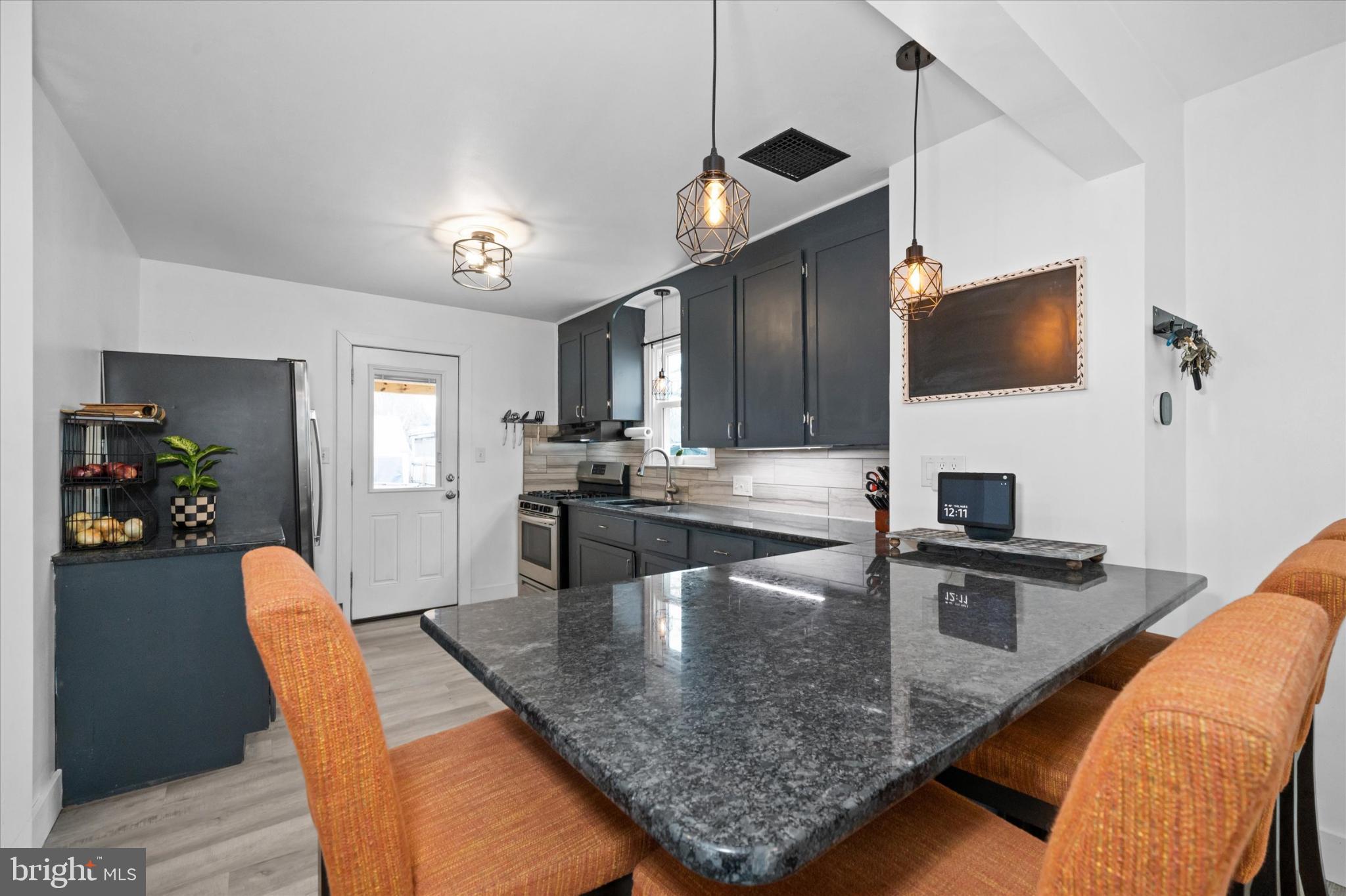7 2nd Avenue New Castle, DE 19720 - Photo 35 of 44 Modern kitchen with sleek design elements.