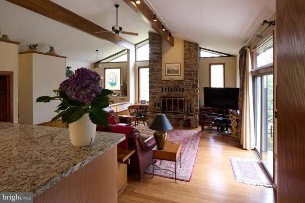 a bedroom with a bed and a table in it