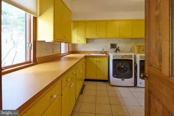 a living room with a couch and a table