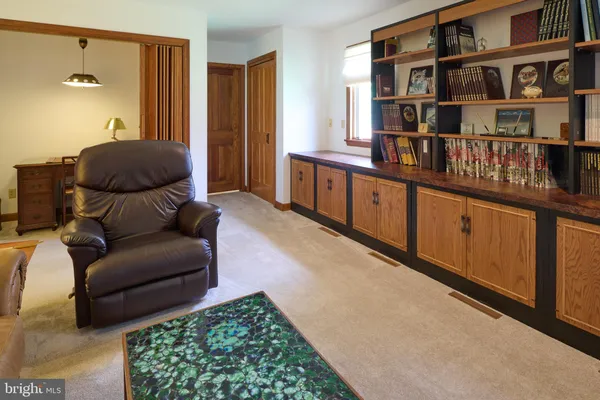a view of a street with a trees on both side of it