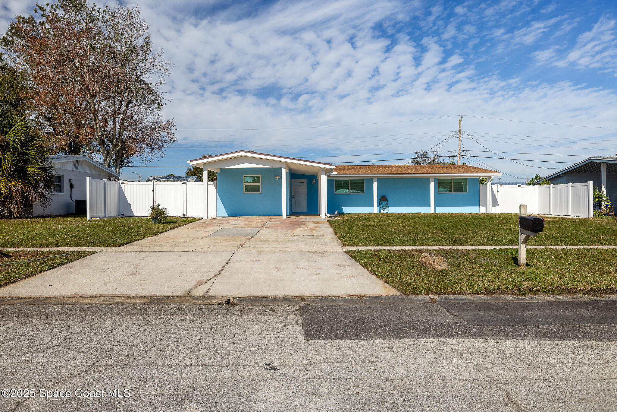 1988 Coolidge Avenue Melbourne, FL 32935 - Photo 16 of 18 front view of house with a yard