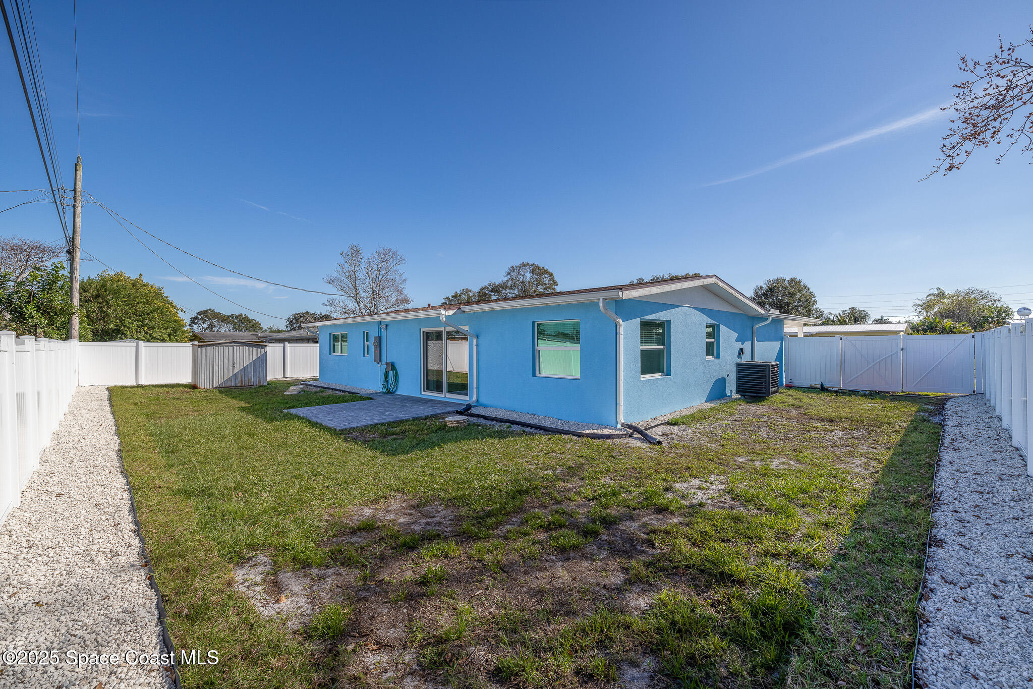 1988 Coolidge Avenue Melbourne, FL 32935 - Photo 18 of 18 a view of a house with a yard