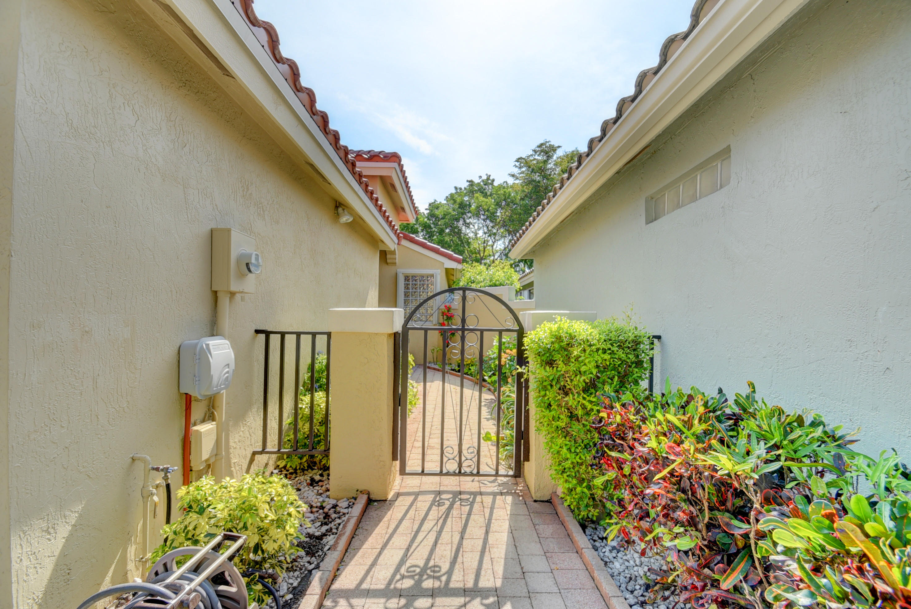 7325 Chorale Road Boynton Beach, FL 33437 - Photo 2 of 83 Path to front door