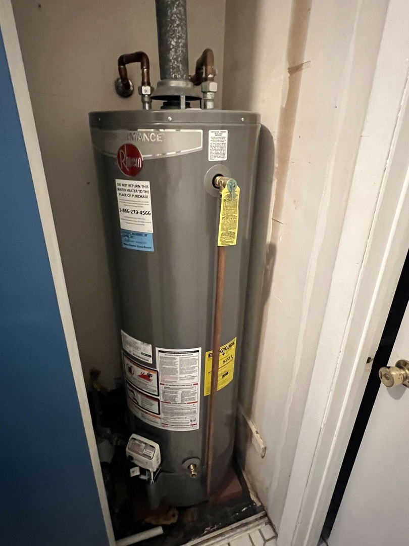 2350 Carnation Drive, Unit 4 Crest Hill, IL 60403 - Photo 12 of 19 a view of water heater