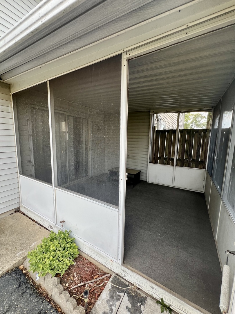 2350 Carnation Drive, Unit 4 Crest Hill, IL 60403 - Photo 15 of 19 a view of a porch