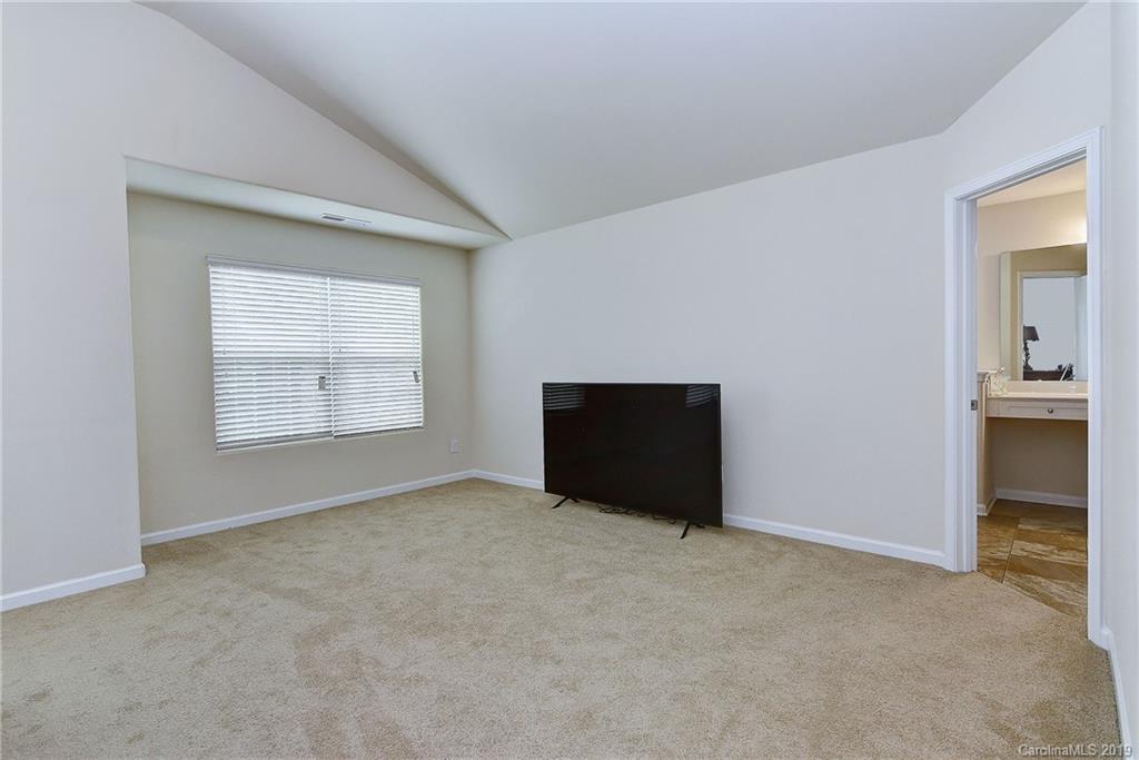 9537 Weikert Road Charlotte, NC 28215 - Photo 20 of 31 an empty room with windows