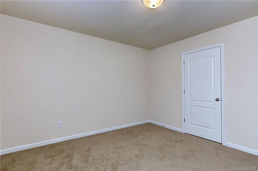 9537 Weikert Road Charlotte, NC 28215 - Photo 27 of 31 an empty room with a empty space