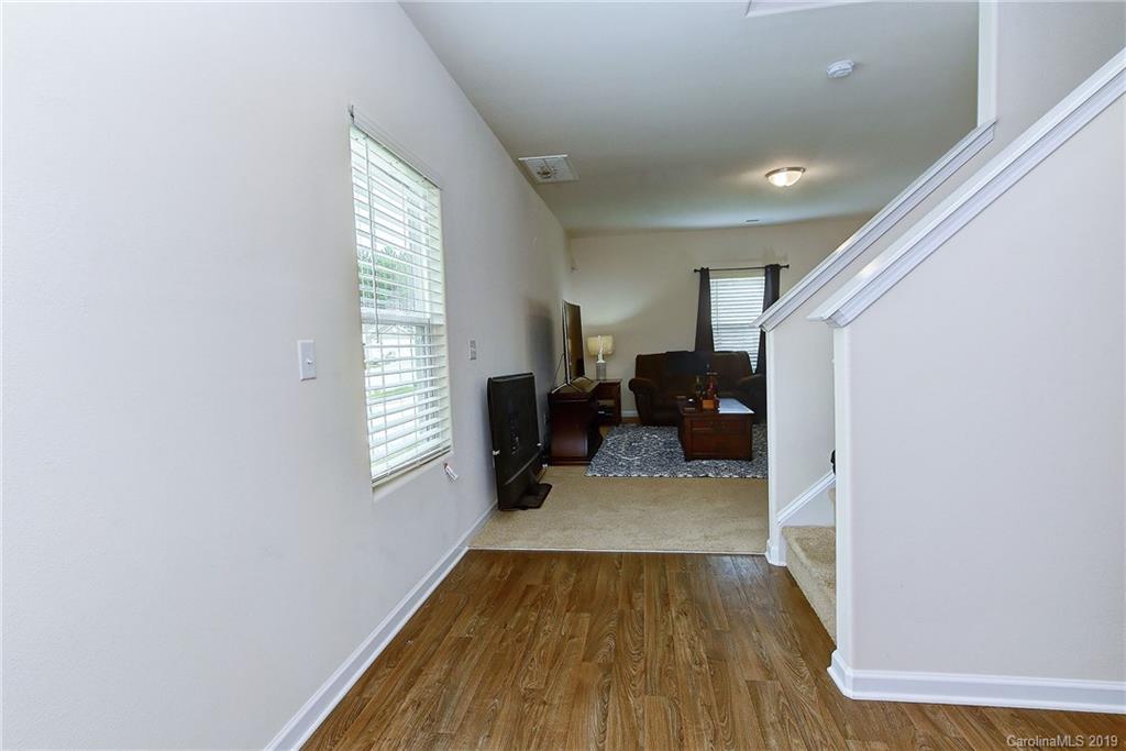 9537 Weikert Road Charlotte, NC 28215 - Photo 6 of 31 a view of livingroom with furniture and wooden floor