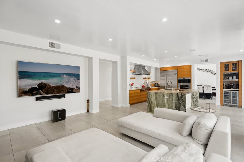 3 Bridgeport Road Newport Coast, CA 92657 - Photo 14 of 25 a living room with furniture and a flat screen tv