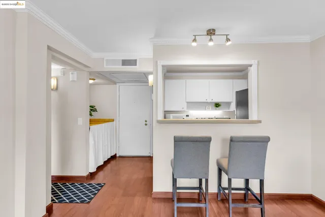 a living room with a sink and a window