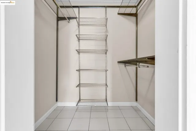 a bathroom with a sink vanity mirror and toilet