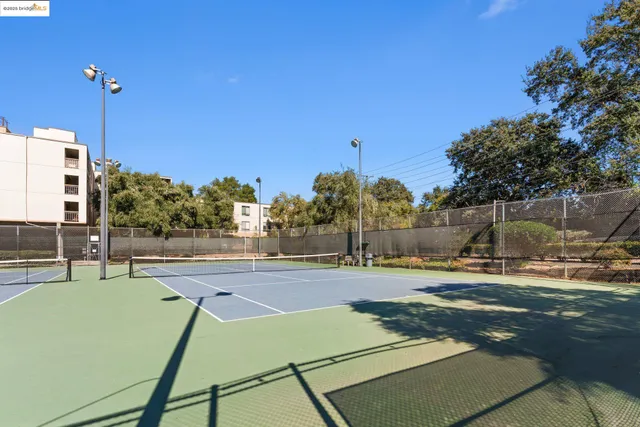 an empty room with wooden floor