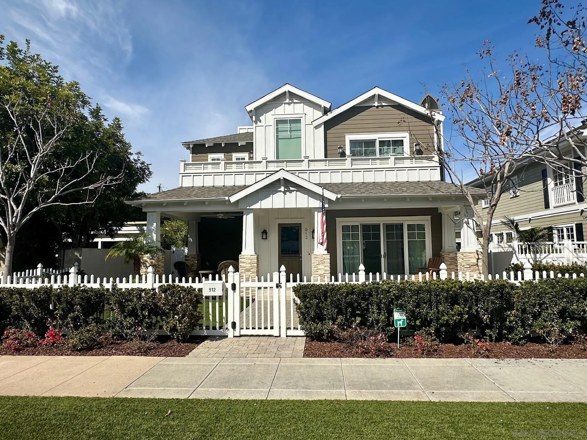 912 A Avenue Coronado, CA 92118 - Photo 1 of 1 a front view of a house with a yard