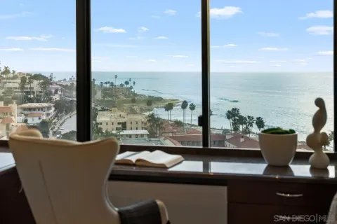 a view of a living room with furniture