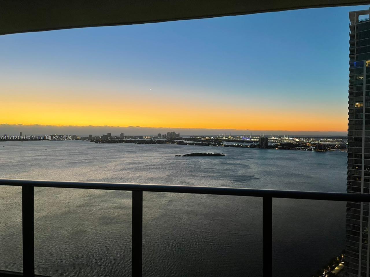 650 Northeast 32nd Street, Unit 3606 Miami, FL 33137 - Photo 16 of 20 a view of lake and mountain