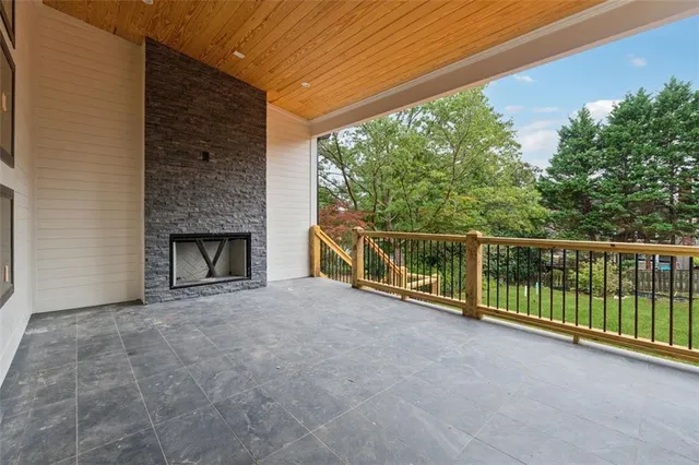 a view of backyard with green space