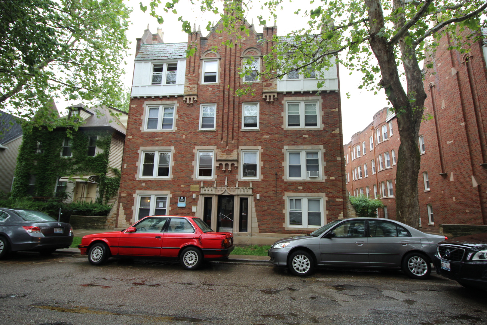 a cars parked in front of a building