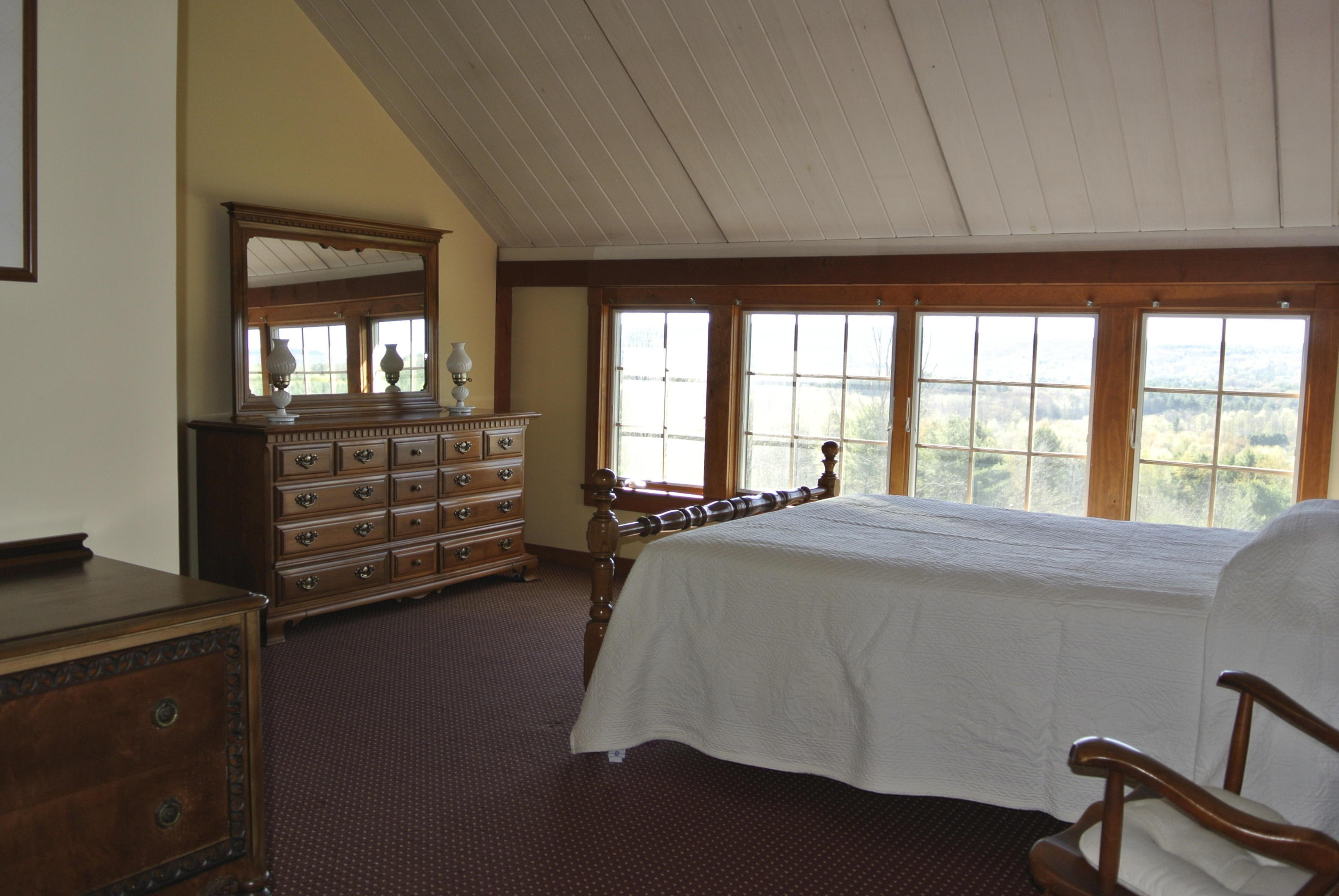 58 Swamp Road West Stockbridge, MA 01266 - Photo 12 of 21 a bed sitting in a spacious bedroom next to a window
