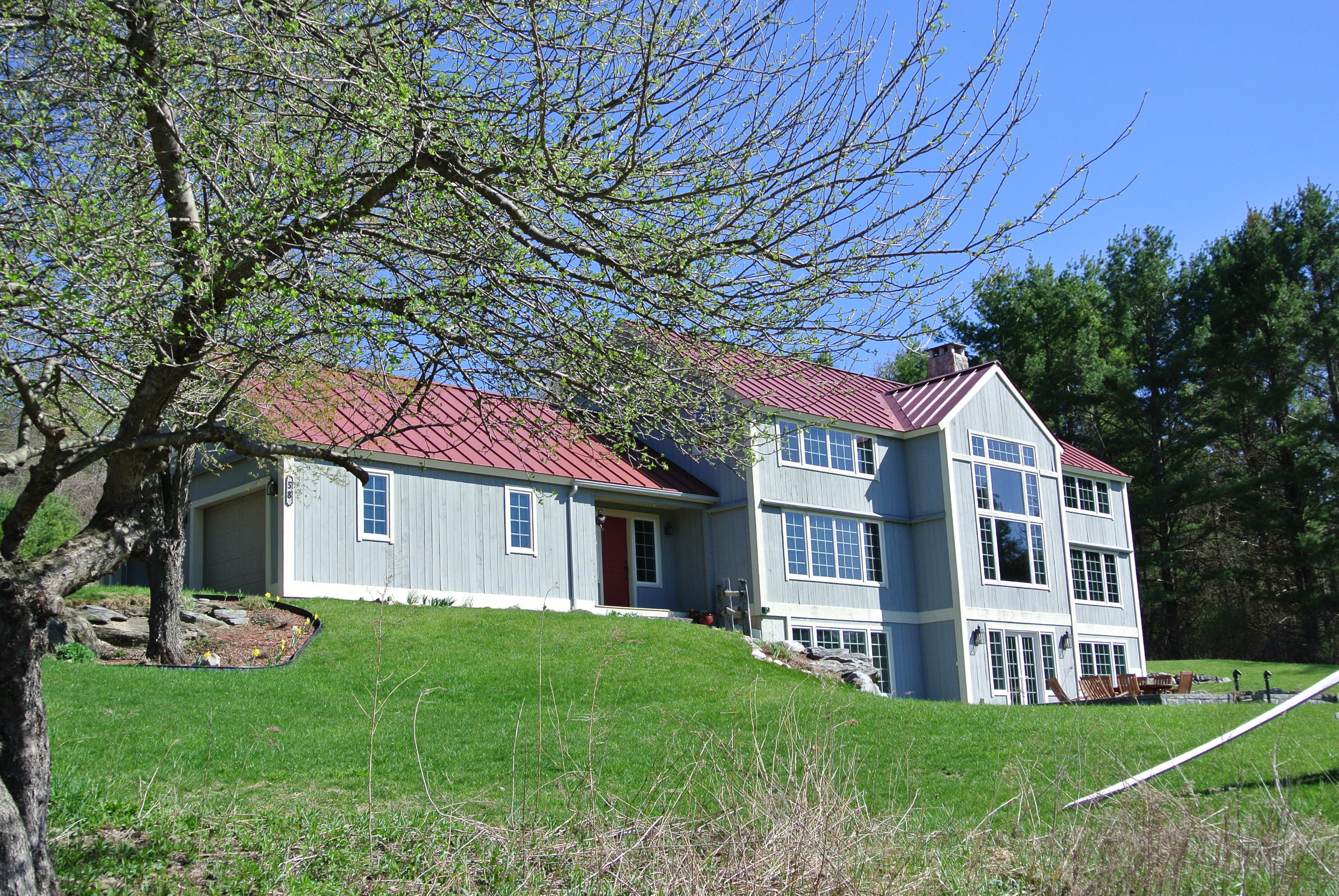 58 Swamp Road West Stockbridge, MA 01266 - Photo 17 of 21 a front view of a house with yard and green space