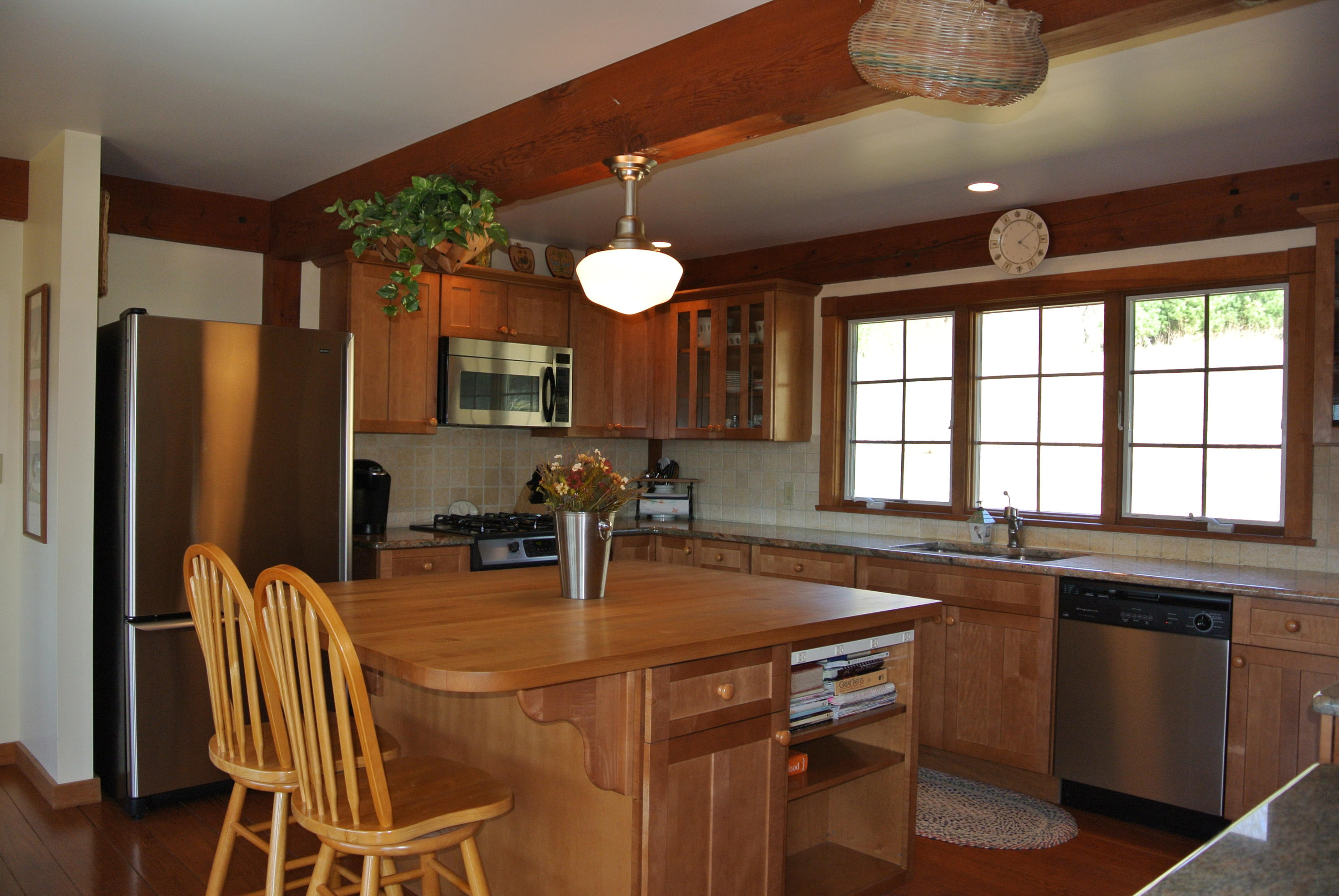 58 Swamp Road West Stockbridge, MA 01266 - Photo 8 of 21 a kitchen with a table chairs sink and microwave