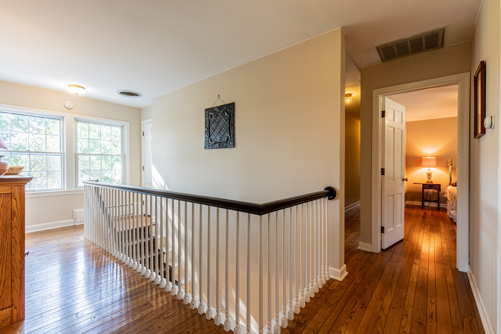 1840 South Main Street Princeton, IL 61356 - Photo 23 of 51 a view of a hallway with wooden floor and windows