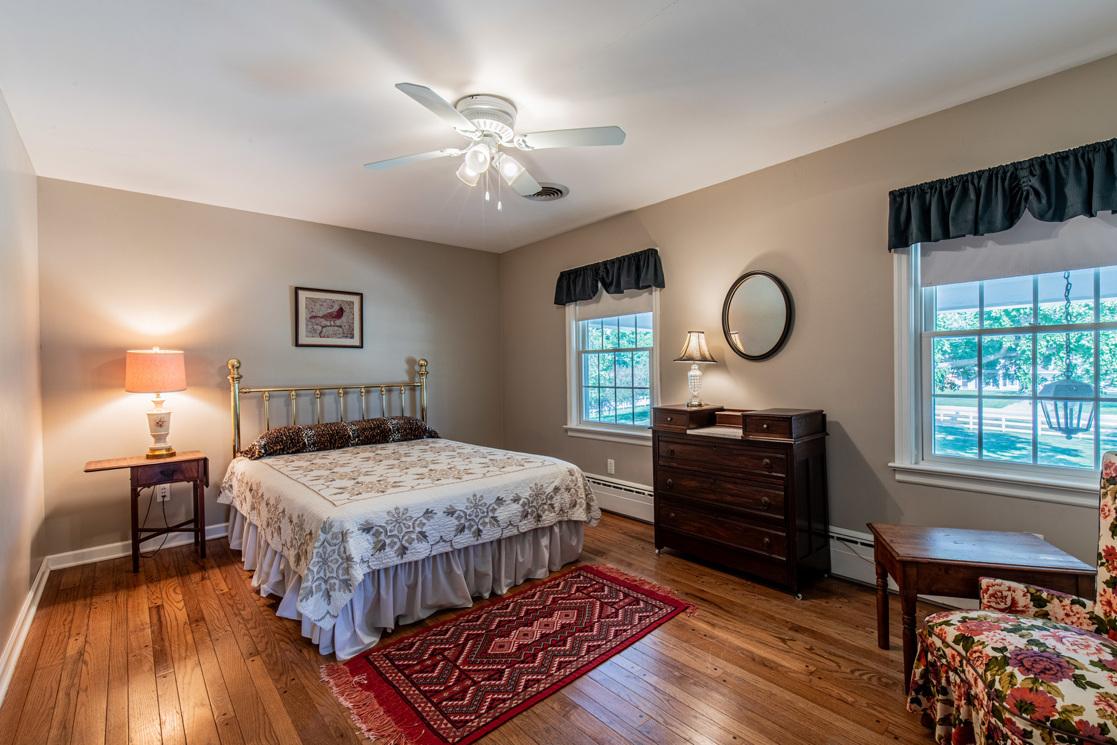 1840 South Main Street Princeton, IL 61356 - Photo 29 of 51 a bedroom with a bed and wooden floor