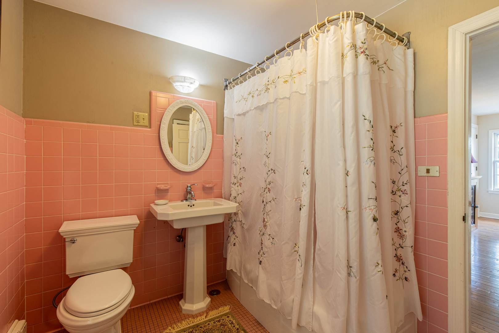1840 South Main Street Princeton, IL 61356 - Photo 30 of 51 a bathroom with a toilet a sink and a mirror